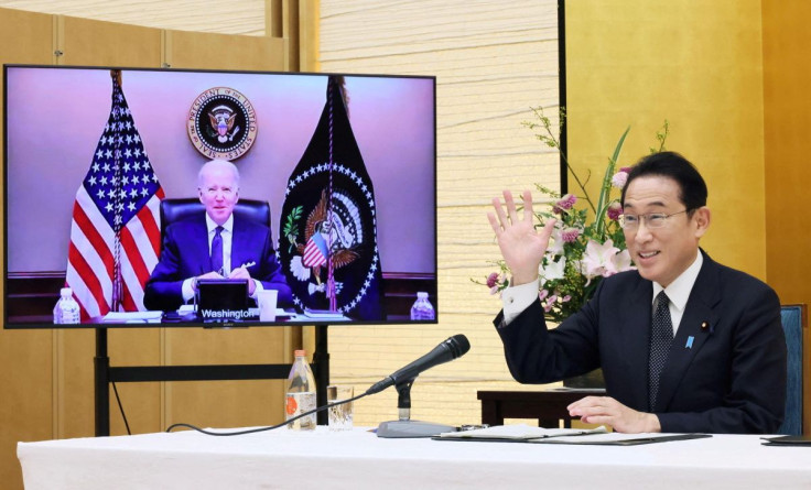 Japan's Prime Minister Fumio Kishida attends a virtual meeting with the U.S. President Joe Biden at his official residence in Tokyo, Japan January 21, 2022,  in this photo released by Japan's Cabinet Public Relations Office via Kyodo.  Japan's Cabinet Pub