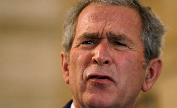 U.S. President George W. Bush reacts to a question after a man threw a shoe at him during a joint statement with Iraqi Prime Minister Nouri al-Maliki in Baghdad, Iraq December 14, 2008.       