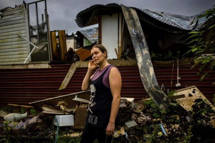 As the February flood drowned Rahima Jackson's house, something sparked a fire and she watched on from a neighbour's window as it burned in the middle of an inland sea