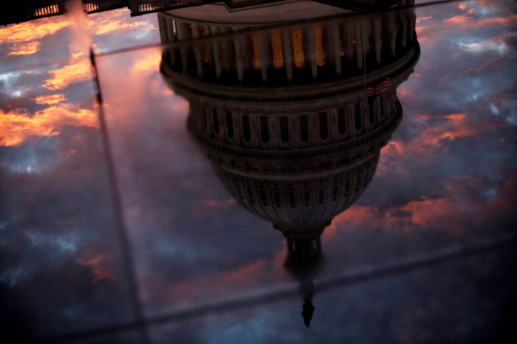 The U.S. Capitol dome is reflected in the glass skylight of the Capitol Visitor Center in Washington, U.S., on midterm Election Day November 6, 2018. 