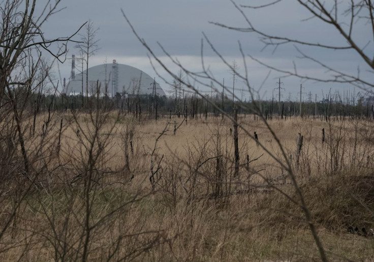 A general view shows an area with high levels of radiation called the Red Forest, and the New Safe Confinement (NSC) structure over the old sarcophagus covering the damaged fourth reactor at the Chornobyl Nuclear Power Plant as Russia's attack on Ukraine 