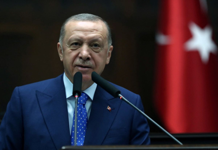 Turkish President Tayyip Erdogan addresses members of his ruling AK Party (AKP) during a meeting at the parliament in Ankara, Turkey May 18, 2022. Murat Cetinmuhurdar/Presidential Press Office/Handout via REUTERS