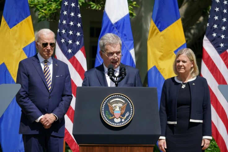 Finnish President Sauli Niinisto speaks in the White House Rose Garden with US President Joe Biden and Swedish Prime Minister Magdalena Andersson at his side