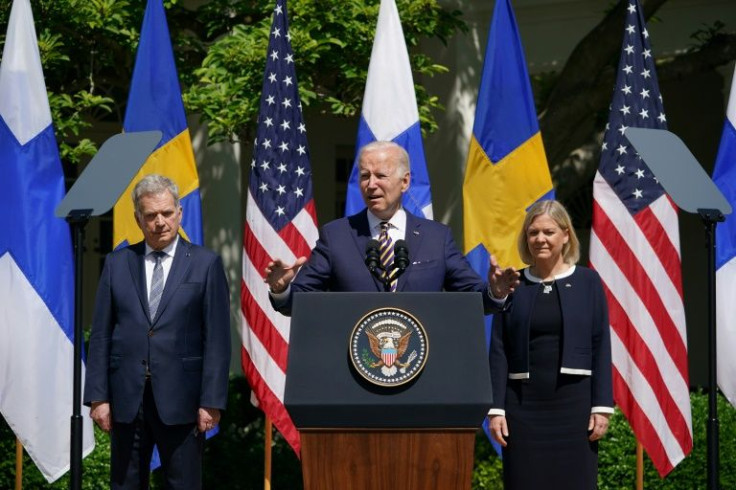 Joe Biden, flanked by Sweden's Prime Minister Magdalena Andersson and Finlandâs President Sauli Niinisto, at the White House on May 19, 2022 -- the US gave its full support for Sweden and Finland's bids to join NATO