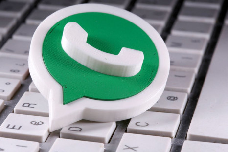 A 3D-printed Whatsapp logo is placed on the keyboard in this illustration taken April 12, 2020. 