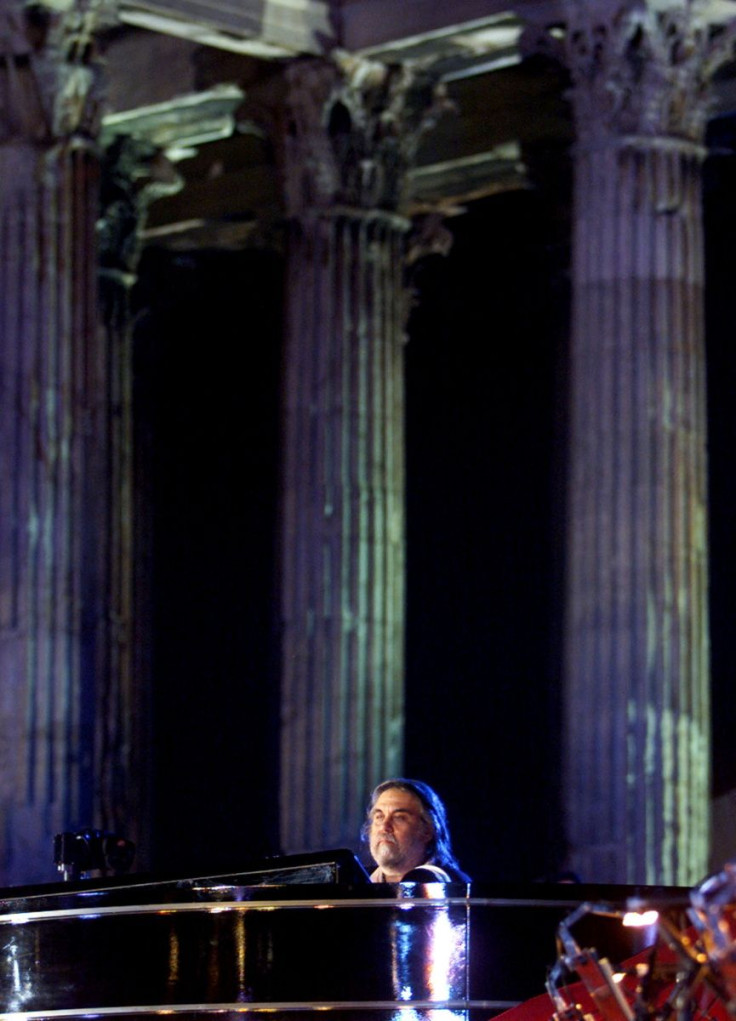 Greek composer Vangelis performs during a concert at the Temple of Zeus in Athens on June 28, 2001. Vangelis presented a 60-minute composition entitled Mythodea./File Photo