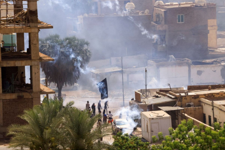 Protesters march during a rally against the country's military rulers in Khartoum, Sudan, May 19, 2022. 
