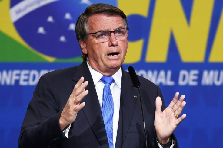 Brazil President Jair Bolsonaro's comments about the country's electronic voting system have led analysts to fear that he may refuse to accept defeat in a scenario similar to the January 2021 invasion of the Capitol by supporters of Donald Trump