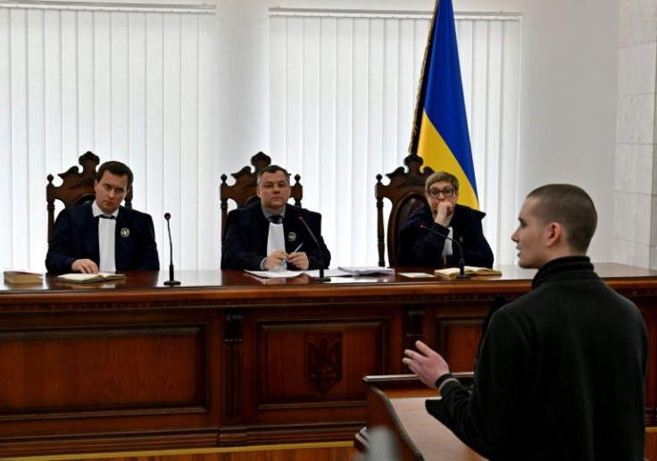 Ivan Matysov (R) testifies in the case of fellow Russian soldier Vadim Shishimarin, the first Russian to stand trial on war crimes charges in Ukraine since Russia invaded the country