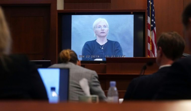Actress Ellen Barkin is seen on a monitor in recorded testimony at the defamation case filed by Johnny Depp against his former wife Amber Heard