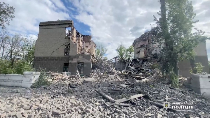 View of a damaged building after it was struck, by what was reported to be an air strike, during Russia's invasion of Ukraine, in Bakhmut, Donetsk Region, Ukraine, in this screengrab obtained from a social media video released May 19, 2022  Donetsk Region