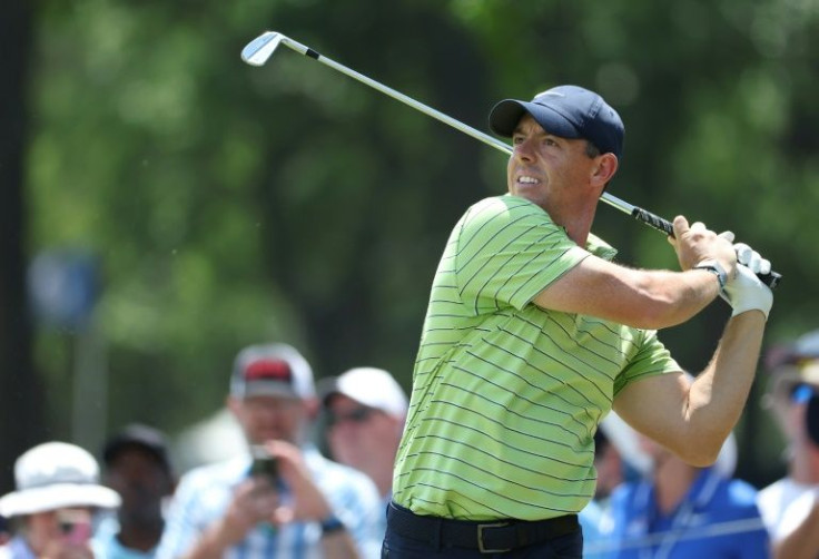 Rory McIlroy watches his tee shot on the sixth hole during his five-under par 65 opening round Thursday at the PGA Championship at Southern Hills