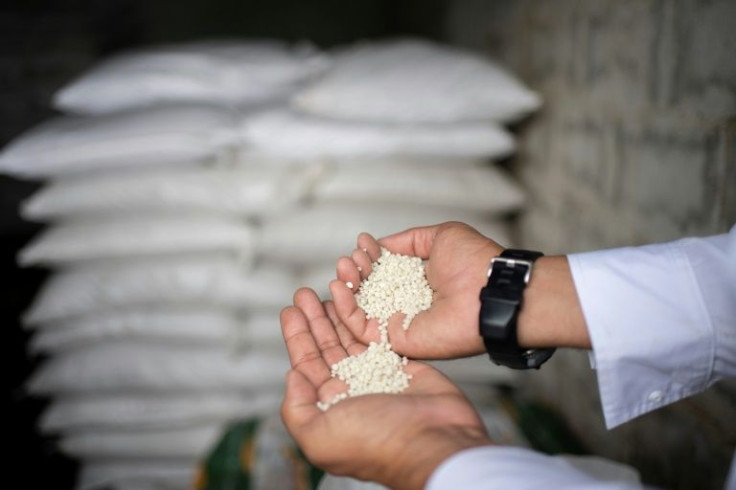 A Venezuelan farmer in the western town of Turen shows some imported Russian fertiliser