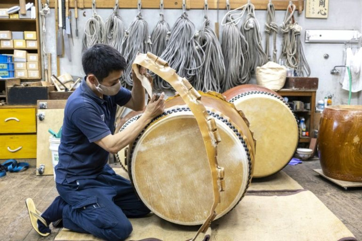 Taiko drums use cow or horsehide paired with a body made from a hollowed-out tree trunk or pieces of wood