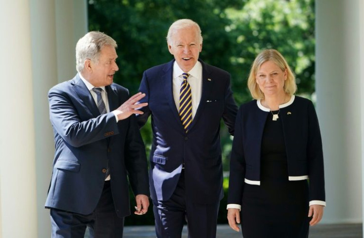 US President Joe Biden (C) welcomed Sweden's Prime Minister Magdalena Andersson (R) and President Sauli Niinisto of Finland at the White House