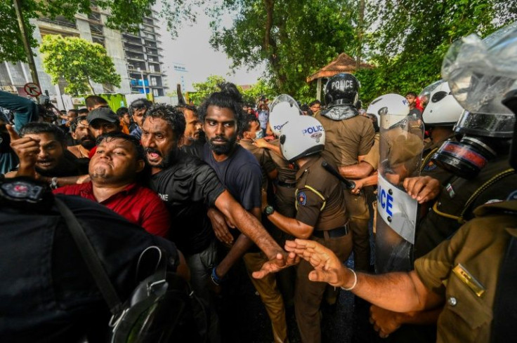 University students and police clash during a demonstration demanding the resignation of Sri Lanka's President Gotabaya Rajapaksa over the country's economic crisis