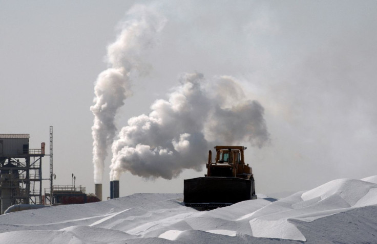 A bulldozer is seen at a magnesium factory near the Dead Sea December 16, 2008.   
