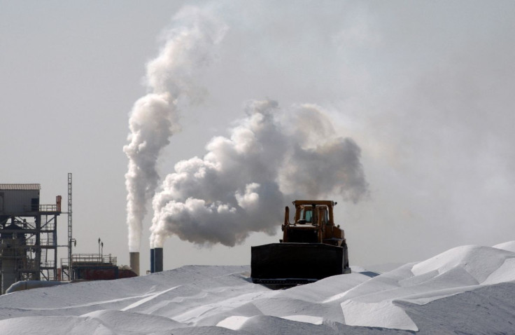 A bulldozer is seen at a magnesium factory near the Dead Sea December 16, 2008.
