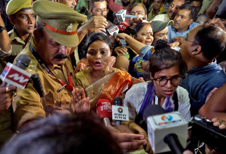 Rakhi Singh, Sita Sahu and Laxmi Devi, three of the five petitioners who filed a plea to pray every day before the idol of a goddess and relics inside the Gyanvapi mosque, speak with the media after they leave the mosque in Varanasi, India, May 14, 2022. 