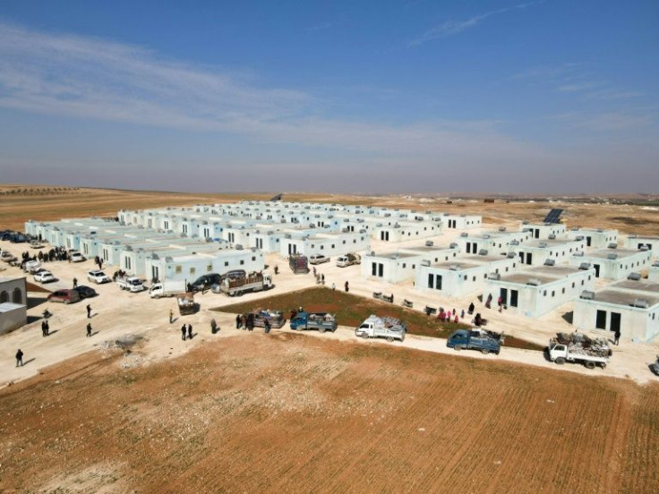 A housing complex built for displaced Syrians near the Turkish-held Syrian city of Al-Bab, one of the residential projects sponsored by Ankara to keep displaced Syrians from crossing into Turkey and to allow it to send there others who already did