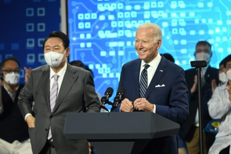 US President Joe Biden speaks alongside South Korean President Yoon Suk-yeol (center-L) -- the pair will hold talks in Seoul as part of Biden's visit to South Korea