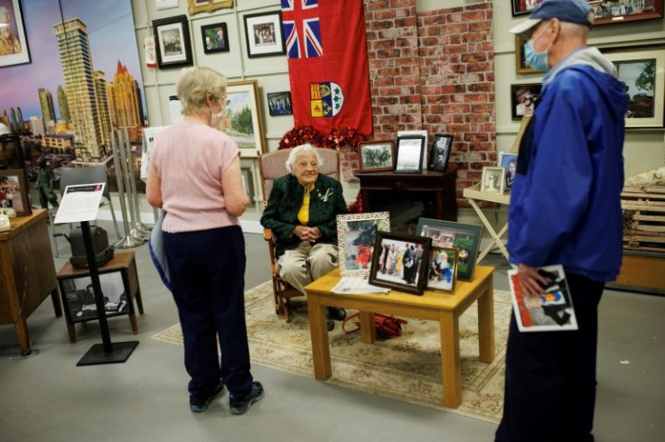 'Hurricane Hazel' -- Visitors chat with McCallion at the exhibit dedicated her life
