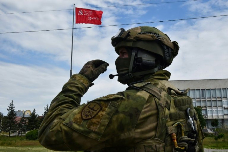 A Russian  soldier on patrol in Kherson