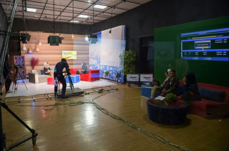 Afghan presenters record a morning TV programme in Kabul in 2017