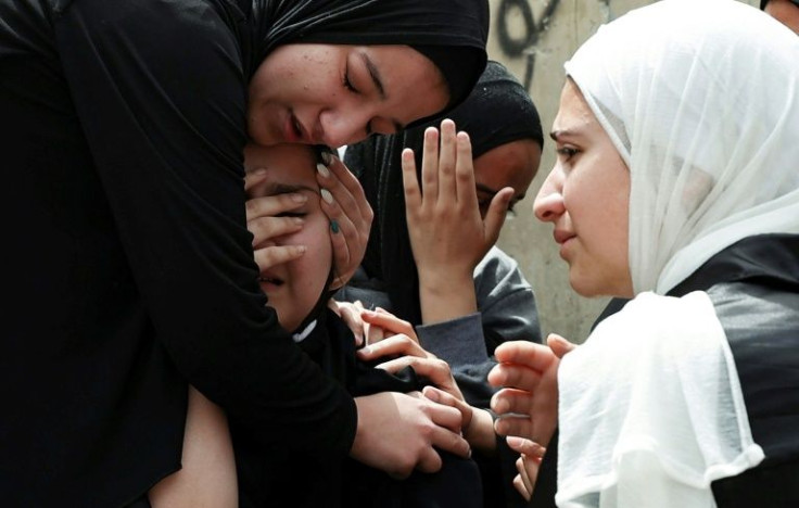 The sisters of 17-year-old Palestinian Amjad al-Fayed mourn his killing during clashes in an Israeli army raid in Jenin, the occupied West Bank