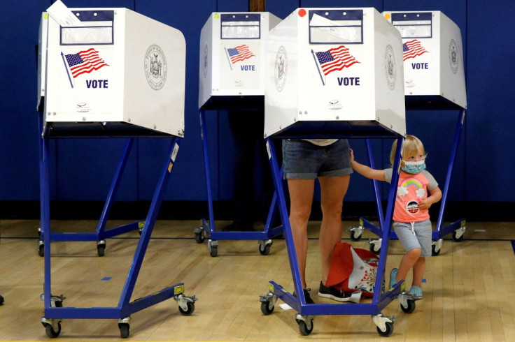 People fill out ballots during voting in the New York primary election at a polling site in the Brooklyn borough of New York City, New York, U.S., June 22, 2021.  