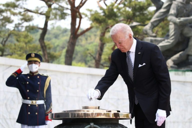 US President Joe Biden participates in a wreath laying ceremony in honour of those who died in the Korean War at the National Cemetery in Seoul