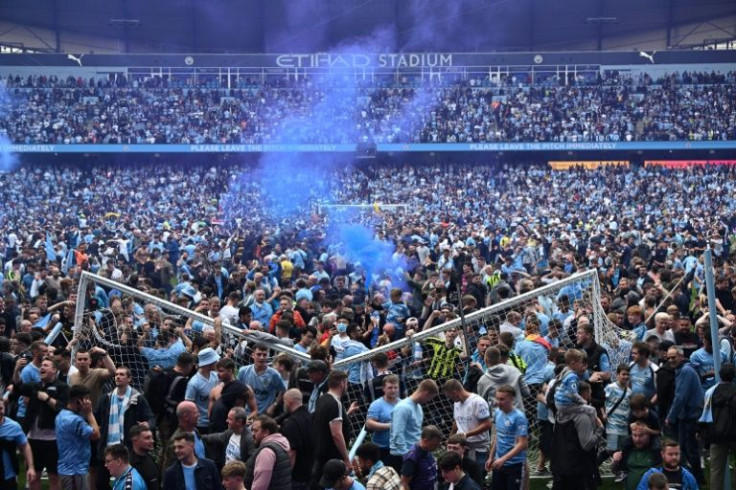 Manchester City fans snapped the crossbar in celebration after winning the Premier League
