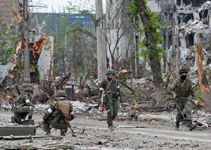 Russian service members work on demining the territory of Azovstal steel plant during Ukraine-Russia conflict in the southern port city of Mariupol, Ukraine May 22, 2022. 