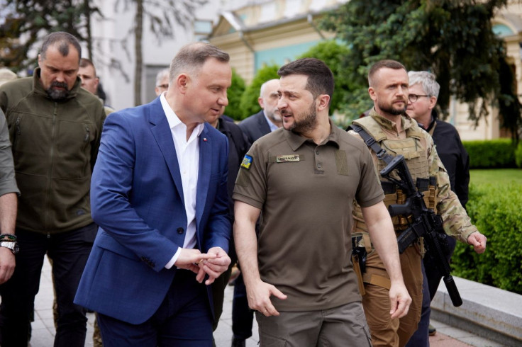 Ukraine's President Volodymyr Zelenskiy and Poland's President Andrzej Duda arrive for a meeting after a parliament session, as Russia's attack on Ukraine continues, in Kyiv, Ukraine May 22, 2022. Ukrainian Presidential Press Service/Handout via REUTERS