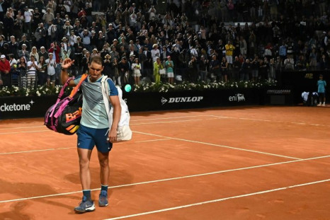 A hobbled Rafael Nadal was beaten in the third round by Denis Shapovalov in Rome