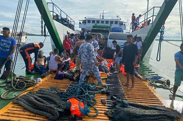 At least seven people were killed and scores plucked to safety in the Philippines on May 23 after a fire ripped through a ferry and forced passengers to jump overboard, coast guard and witnesses say