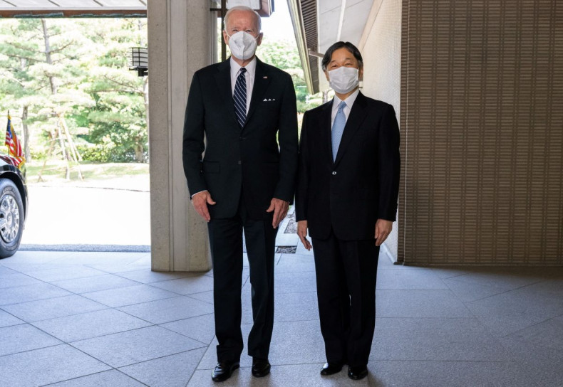Japan's Emperor Naruhito greets U.S. President Joe Biden prior to their meeting at the Imperial Palace in Tokyo, Japan May 23, 2022.   Saul Loeb/Pool via REUTERS