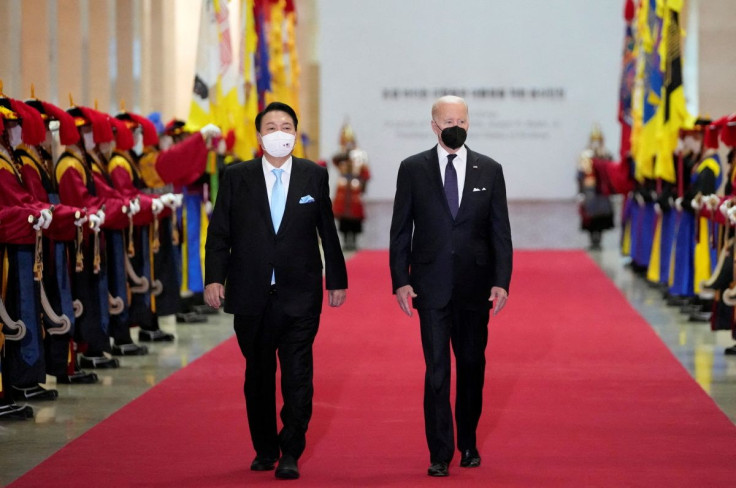 U.S. President Joe Biden and South Korean President Yoon Suk-yeol arrive for a state dinner at the National Museum of Korea, in Seoul, South Korea, May 21, 2022. Lee Jin-man/Pool via REUTERS
