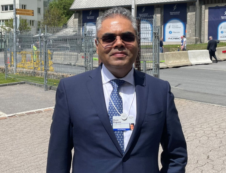 Rishi Kapoor, Co-Chief Executive Officer of Investcorp, poses for a picture after an interview with Reuters during the World Economic Forum (WEF) in the Alpine resort of Davos, Switzerland May 23, 2022.