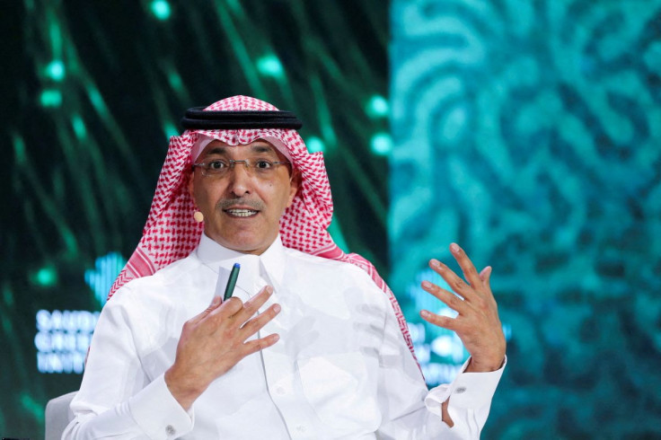 Saudi Minister of Finance Mohammed al-Jadaan gestures as he speaks during the Saudi Green Initiative Forum to discuss efforts by the world's top oil exporter to tackle climate change, in Riyadh, Saudi Arabia, October 23, 2021. 