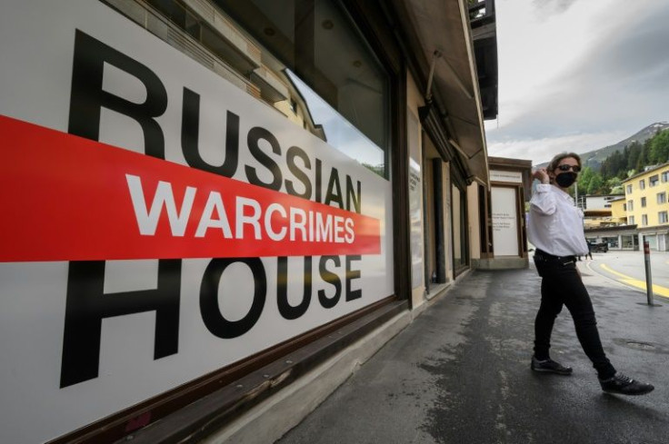 Ukrainians took over the building Russia traditionally uses at Davos to put on an exhibition of atrocities they say Russian forces have committed