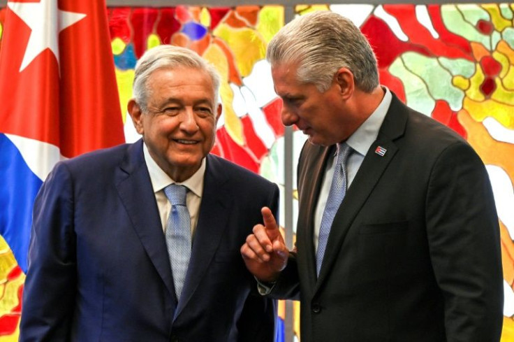 Cuban President Miguel Diaz Canel (right) meets his Mexican counterpart Andres Manuel Lopez Obrador at the Revolution Palace in Havana on May 8, 2022