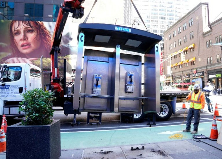 New York City removed the last of its iconic payphone booths, victims of the cell phone and free hotspots the city is providing
