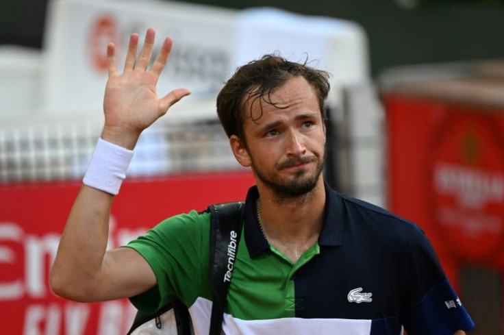 See you! Daniil Medvedev waves as he leaves the court after being defeated by Richard Gasquet in Geneva last week