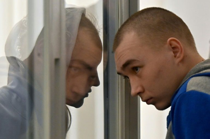 Vadim Shishimarin looked on from a glass box as he was sentenced in a trial followed around the world