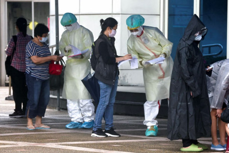 People wait to get a coronavirus disease (COVID-19) test in Taipei, Taiwan, May 24, 2022. 