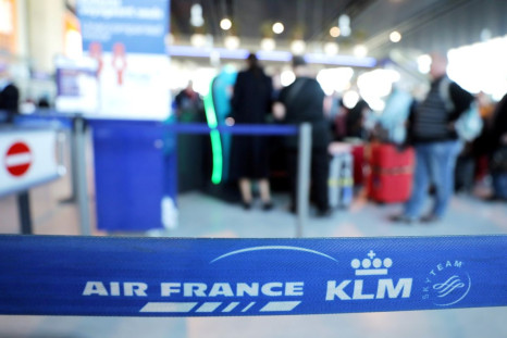 Passengers wait at the Air France desk at Nice international airport, France, February 20, 2020. 