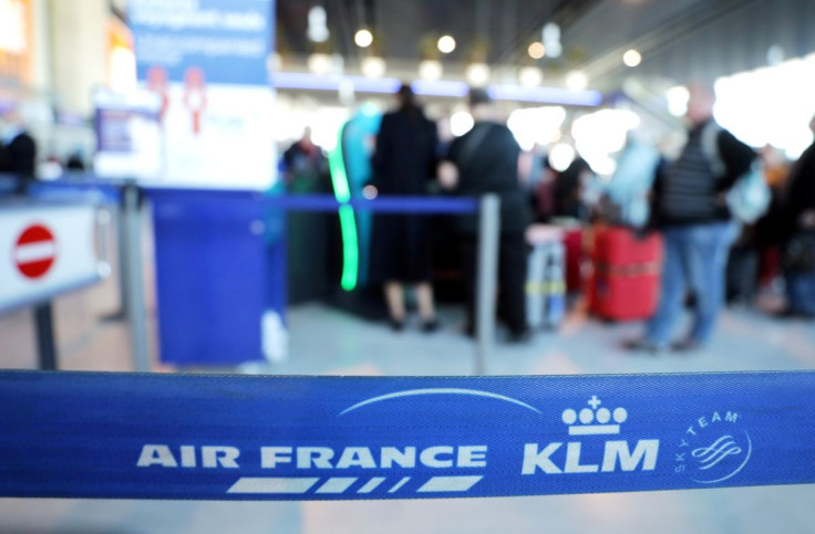 Passengers wait at the Air France desk at Nice international airport, France, February 20, 2020. 