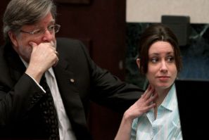 Casey Anthony, with defense counsel Cheney Mason, looks on during day 19 of her 1st-degree murder trial at the Orange County Courthouse, in Orlando, Florida