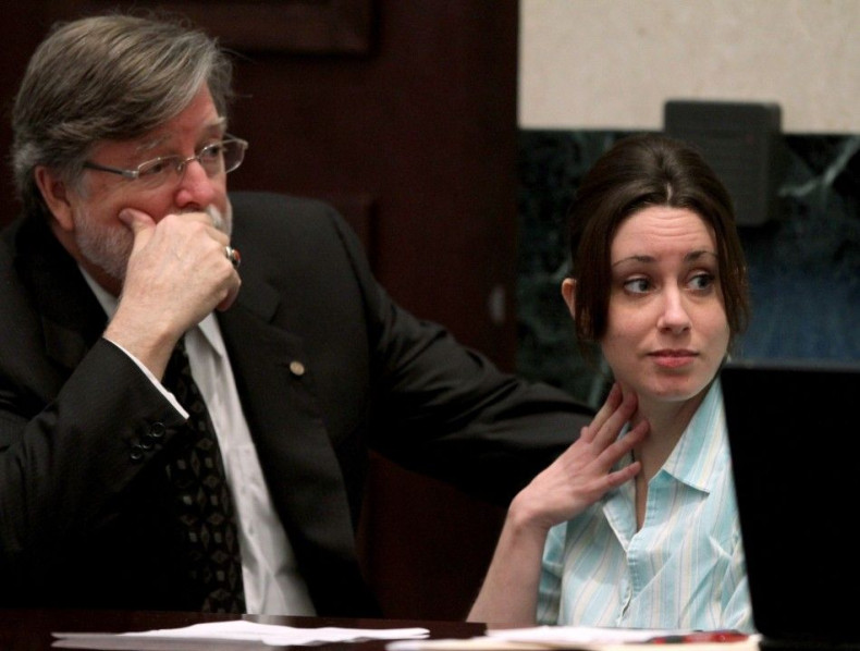 Casey Anthony, with defense counsel Cheney Mason, looks on during day 19 of her 1st-degree murder trial at the Orange County Courthouse, in Orlando, Florida
